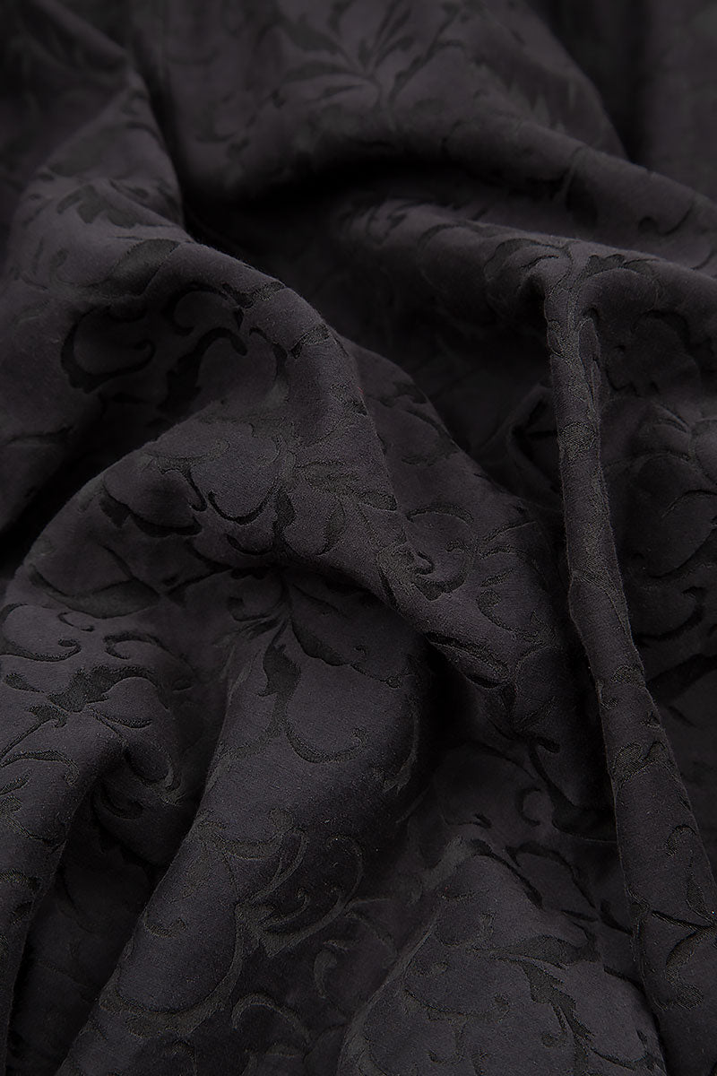 Pantalon ample en soie et coton noir orné