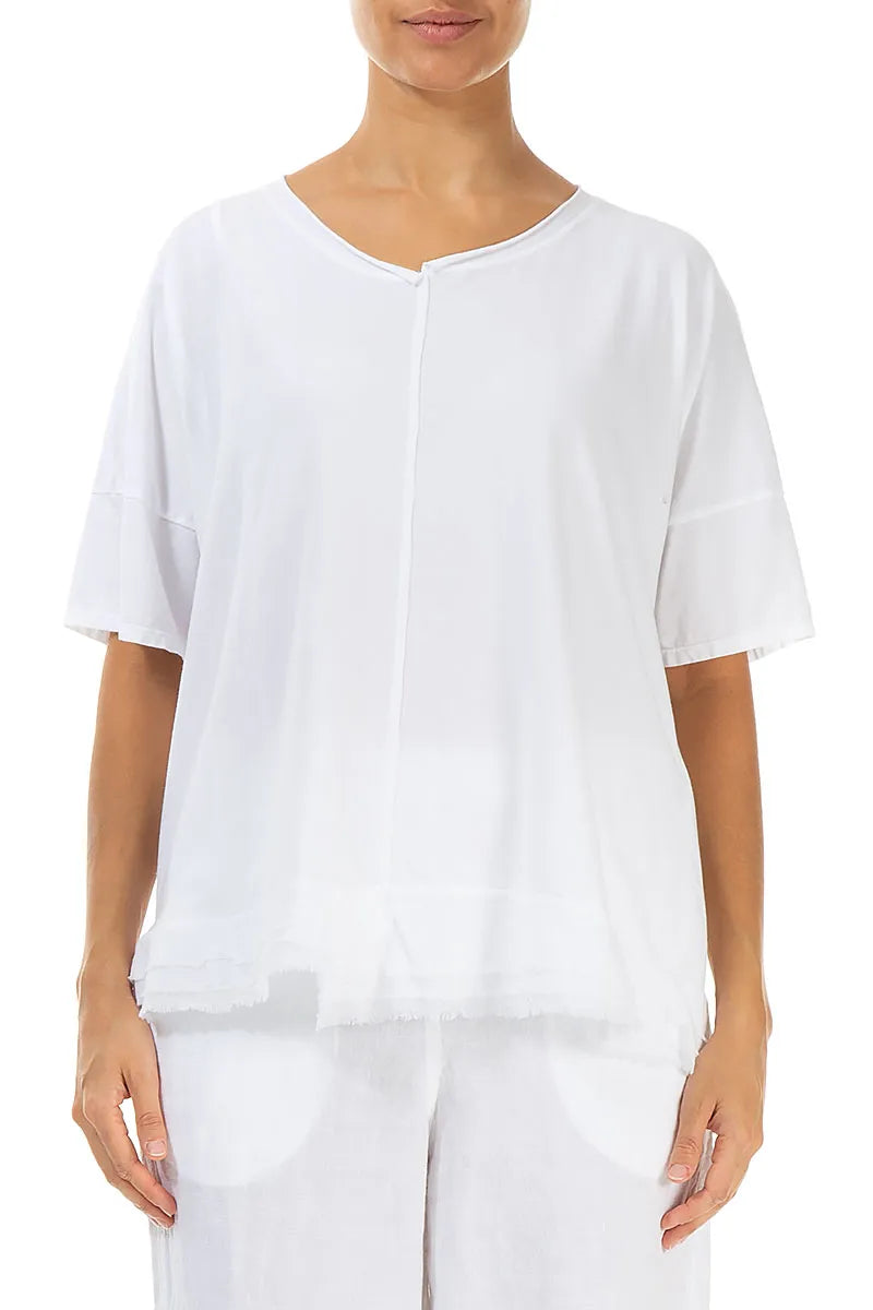 Haut blanc en coton à ourlet effiloché