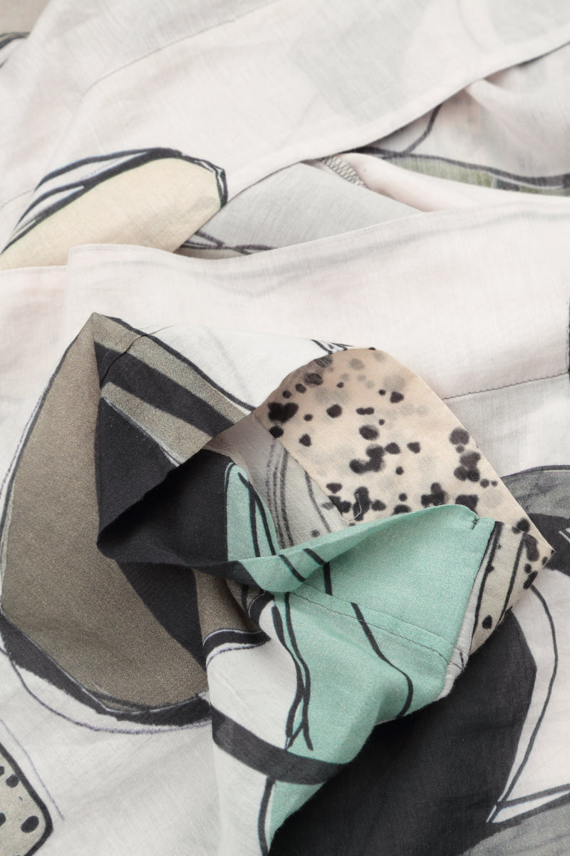 Chemise en soie et coton à effet pierre roulée superposée