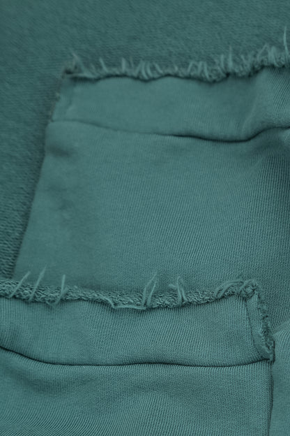 Asymmetrische Dunkeltürkis-Bluse aus French-Terry-Baumwolle