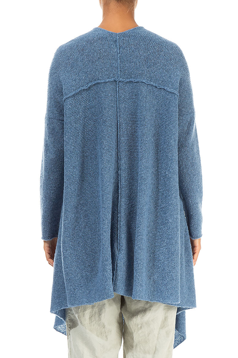 Pull asymétrique en laine bleu pétrole à col en V