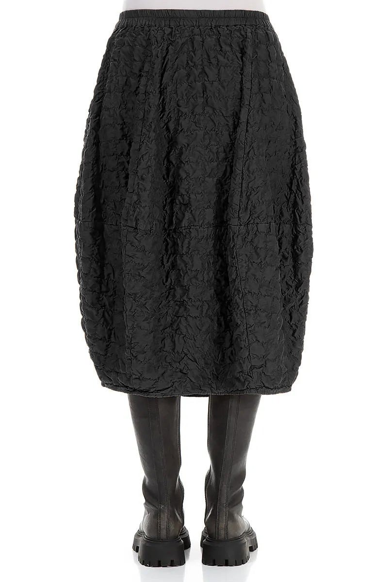 Jupe bouffante plissée en soie noire et bambou