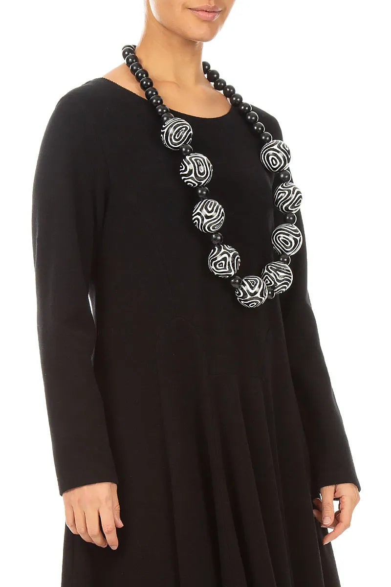 Collier de perles en bois Contour Rhythm