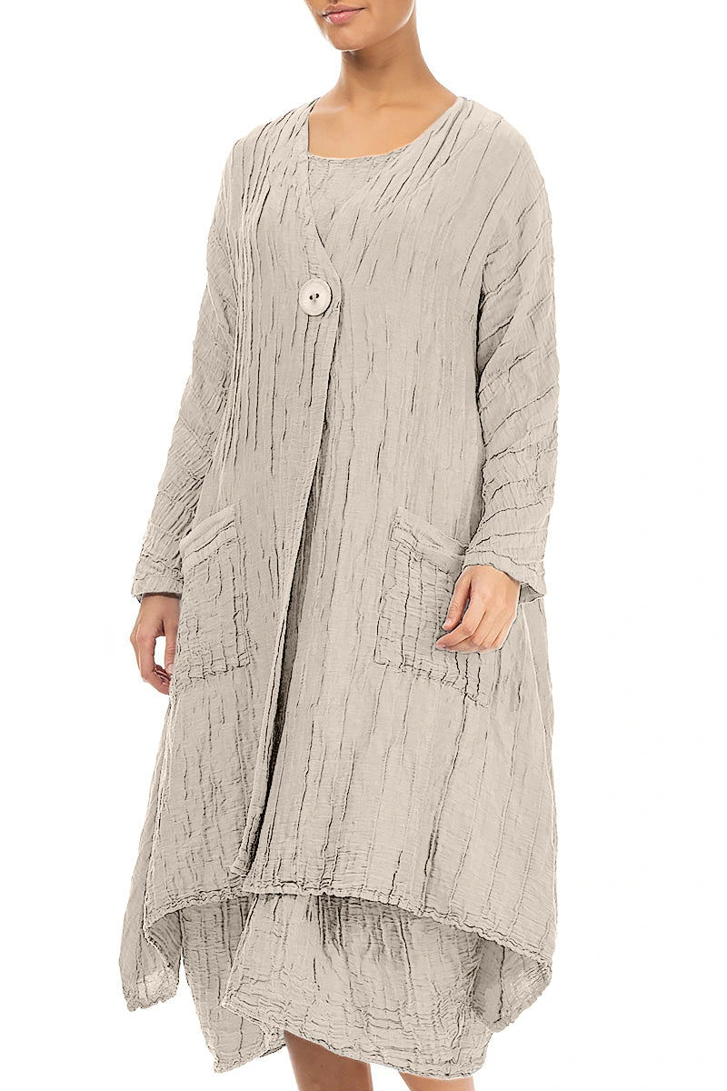 Veste en lin et soie beige froissé à ourlet tombant