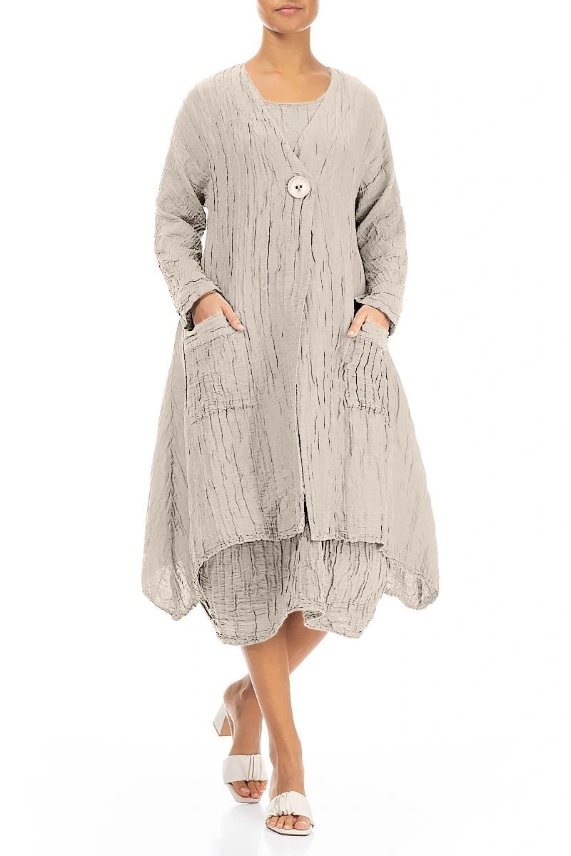Veste en lin et soie beige froissé à ourlet tombant