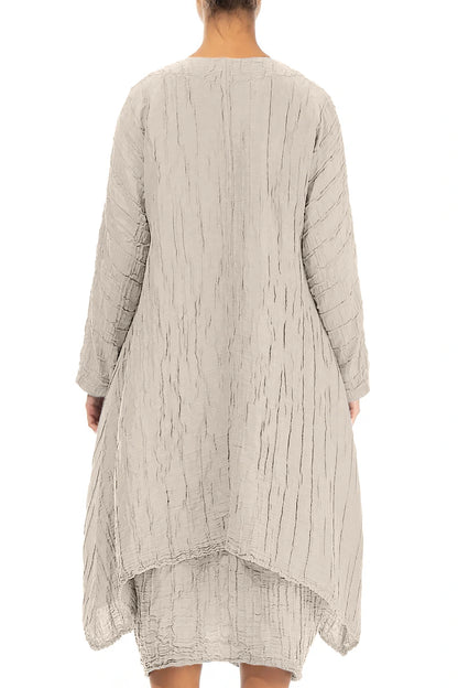 Veste en lin et soie beige froissé à ourlet tombant