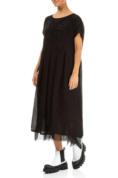 Robe en soie noire à motif papillon évasé