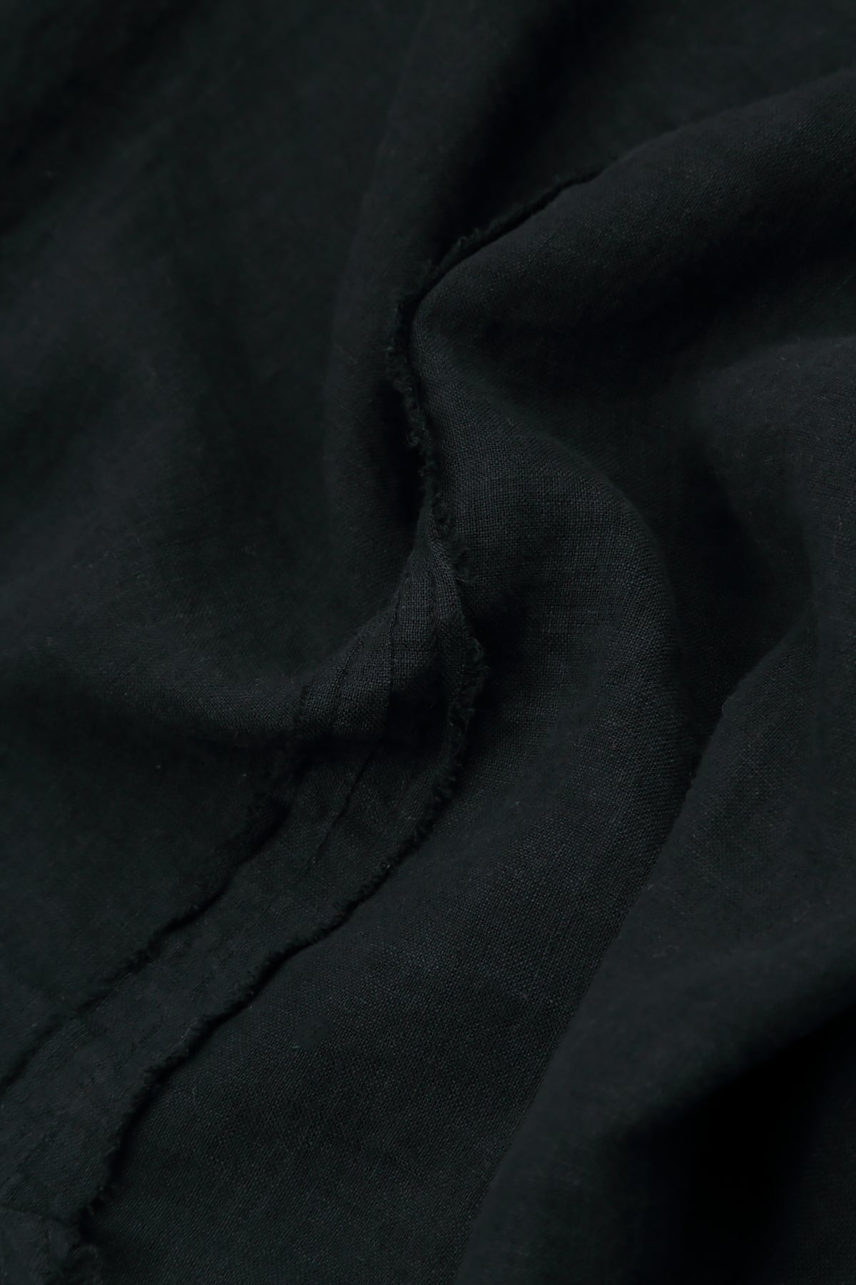 Ausgestellte, lockere schwarze Leinenbluse