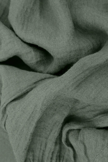 Ausgestelltes, salbeigrünes Leinenkleid