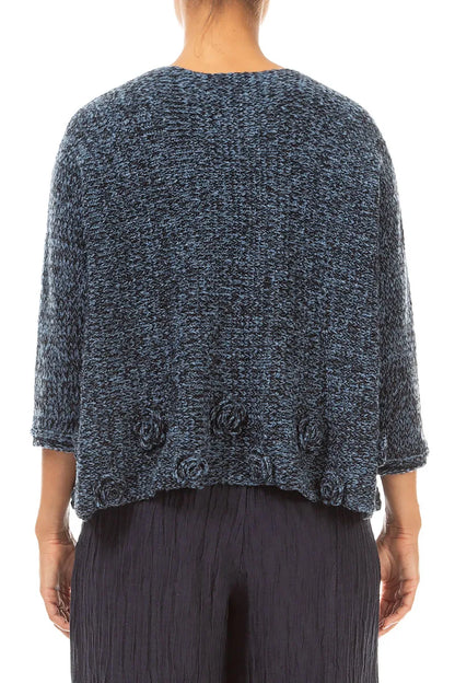 Pullover aus Mélange-Wolle in Blau mit Blumenverzierung