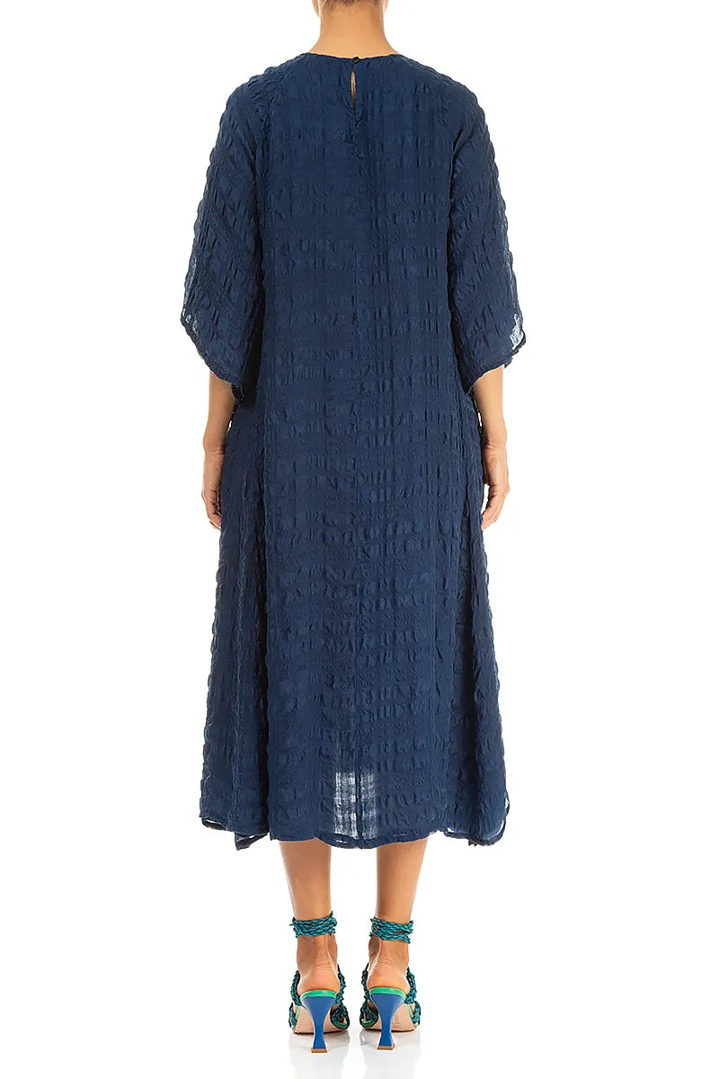 Robe longue en soie bleu marine superposée