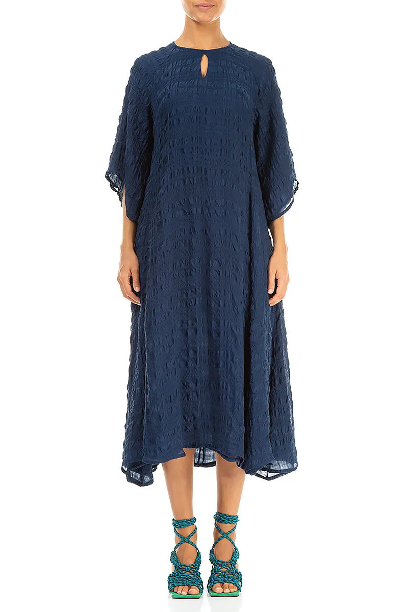 Robe longue en soie bleu marine superposée