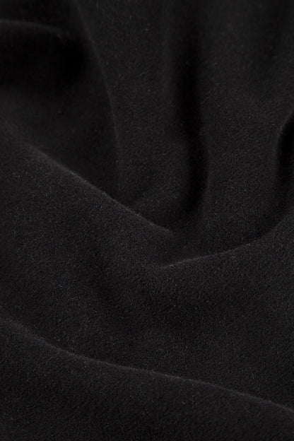 Lange, schmal zulaufende Hose aus schwarzem Baumwolljersey