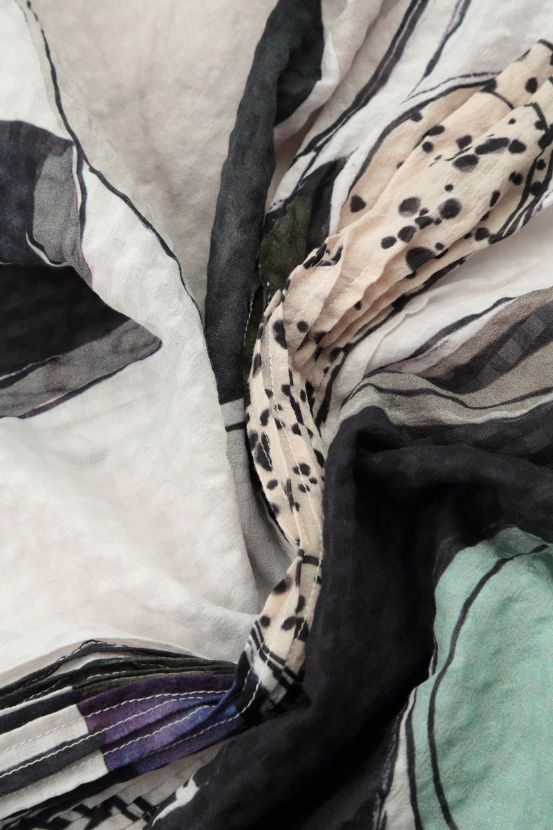 Chemisier en soie texturée effet pierre roulée à plis piqués