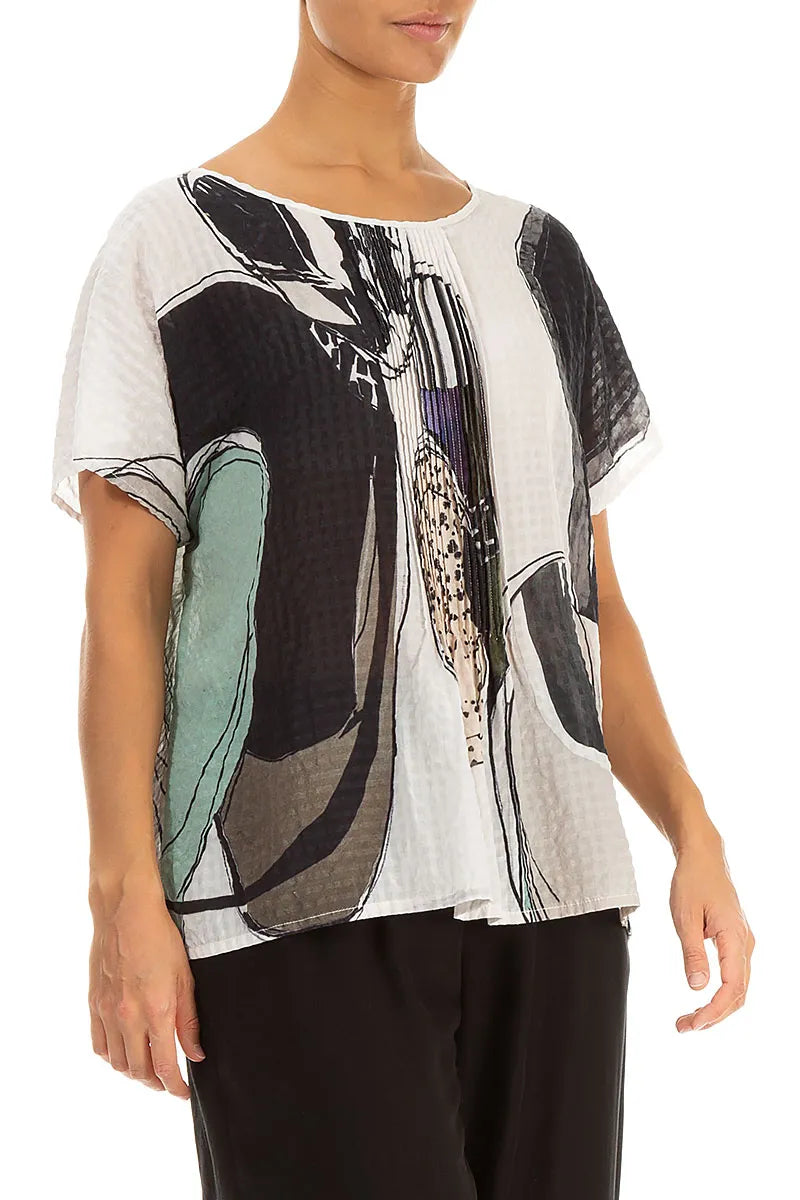 Chemisier en soie texturée effet pierre roulée à plis piqués