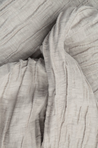 Robe sans manches en soie et lin beige froissé, à volants bouffants