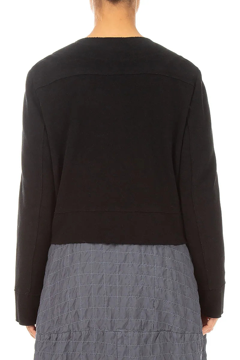 Veste courte en jersey de coton noir avec lien à nouer sur le devant