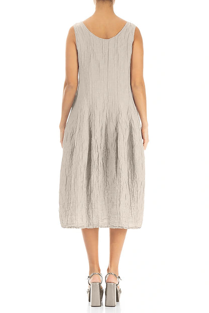 Robe sans manches en soie et lin beige froissé, à volants bouffants