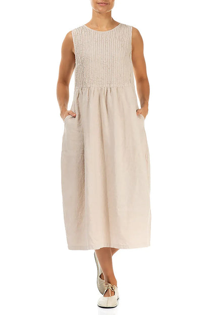 Robe en lin beige sans manches à pinces