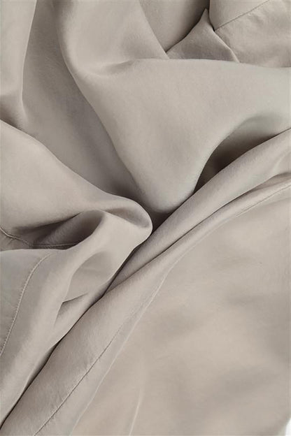 Weite, fließende beige Seidenhose